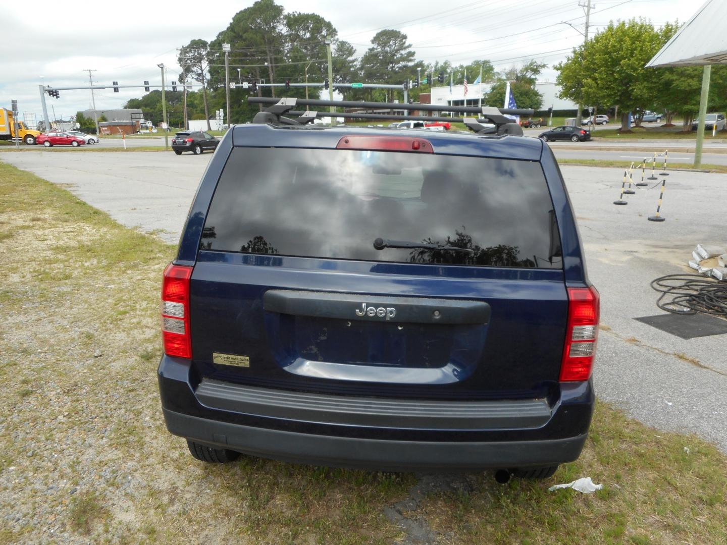 2014 Blue Jeep Patriot Sport 2WD (1C4NJPBA5ED) with an 2.0L L4 DOHC 16V engine, located at 2553 Airline Blvd, Portsmouth, VA, 23701, (757) 488-8331, 36.813889, -76.357597 - Photo#6